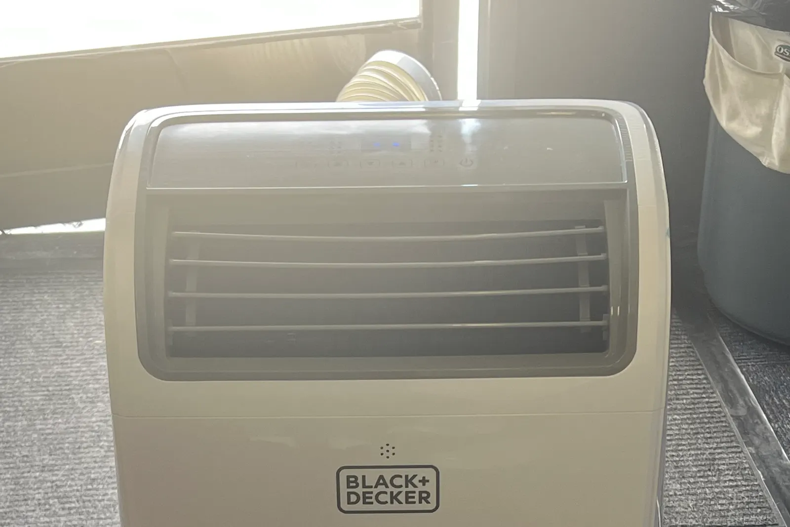 Sleek white tower portable air conditioning units discreetly placed along the walls of an elegant event hall during a quinceañera or wedding reception in El Paso, TX — Sweet n' Sassy Creations indoor AC rental