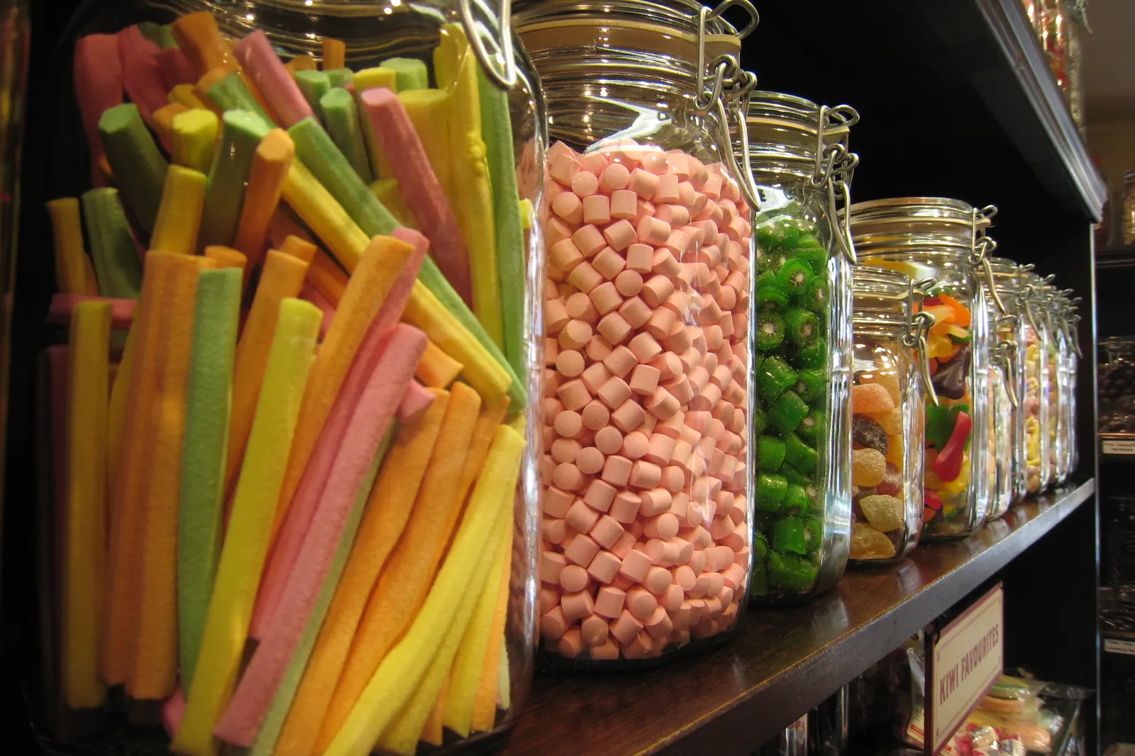 Magical Willy Wonka candy bar with giant rainbow gumballs and lollipops at a birthday party in Horizon City near El Paso TX