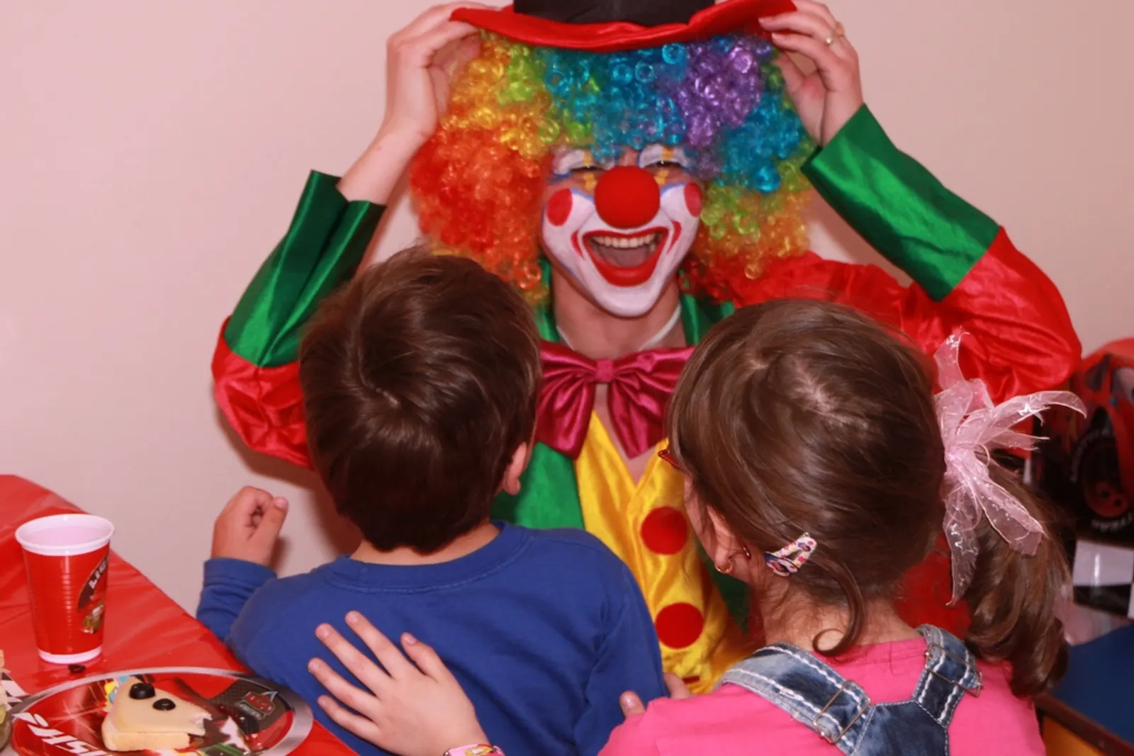 Lively clown show performance with balloon animals at a Sweet n' Sassy Creations birthday party in Downtown El Paso TX